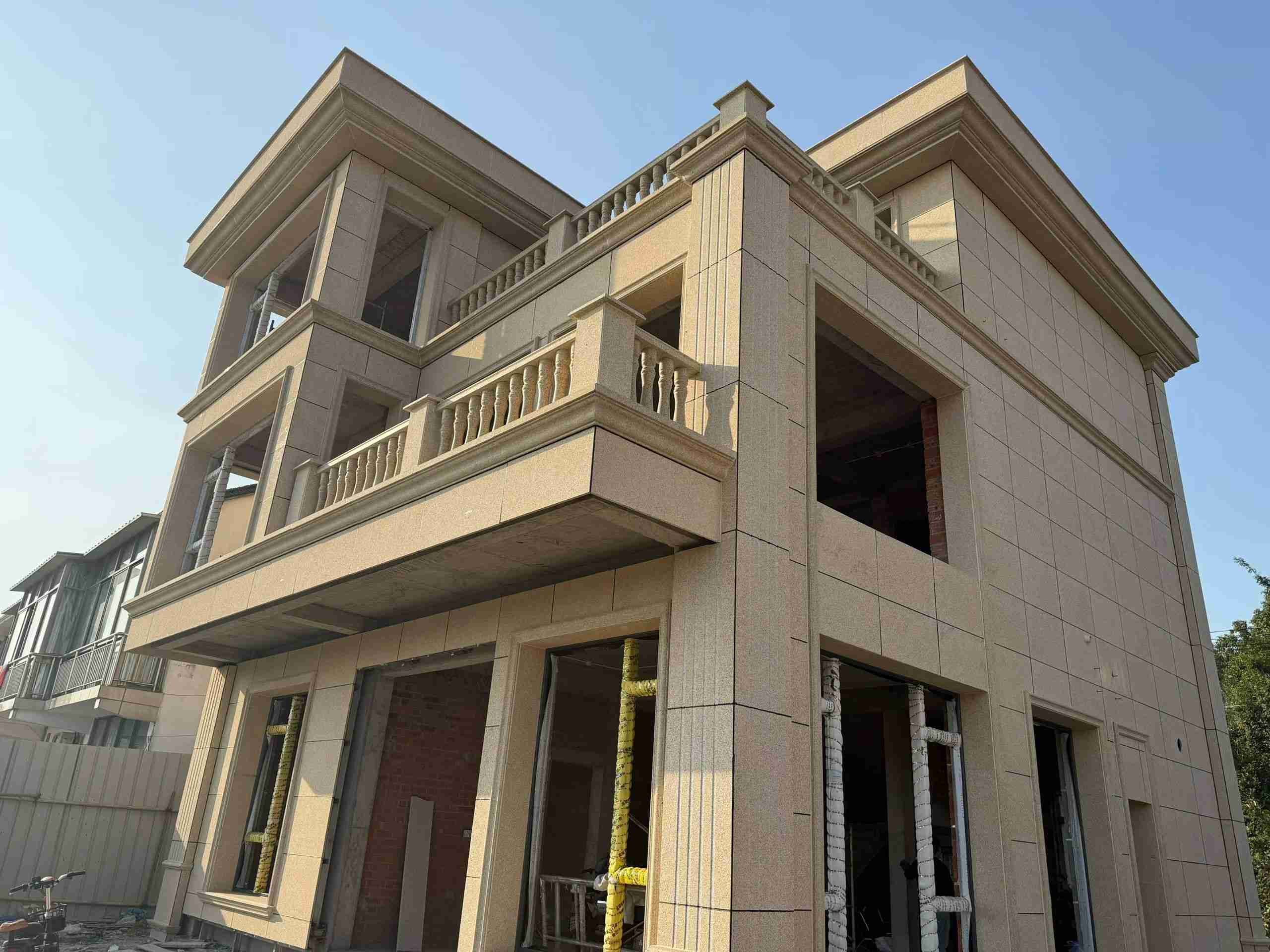 淄博 黄金麻花岗岩石材荔枝面外墙干挂效果展示